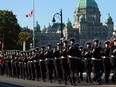 The Royal Guard of Honour lead the ceremonial procession and provincial commemorative service for Queen Elizabeth during a national day of mourning in Victoria, Monday, Sept. 19, 2022.