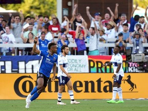 San Jose Earthquakes forward Jeremy Ebobisse (11, left) reacts after scoring a goal against the Vancouver Whitecaps during the first half at PayPal Park.