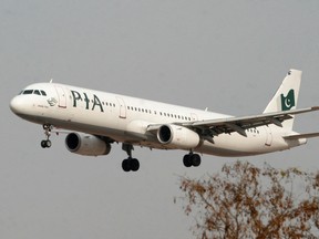 A Pakistan International Airlines (PIA) plane prepares to land at Islamabad airport in Islamabad Feb. 24, 2007.