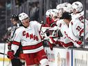 Ethan Bear celebrates his goal with Carolina on Nov.  18, 2021. Three days later, COVID-19 would take a toll that contributed to a sour season.