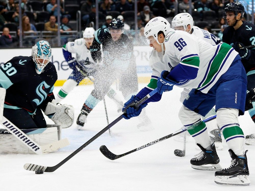 Canucks beat Ducks in OT for 7th straight win under Boudreau - Red