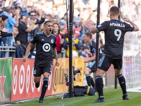 Oct 9, 2022; Saint Paul, Minnesota, USA; Minnesota United midfielder Franco Fragapane (7) is congratulated by forward Luis Amarilla (9) after scoring in the first half against the Vancouver Whitecaps at Allianz Field. Mandatory Credit: Matt Blewett-USA TODAY Sports