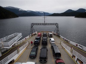 A B.C. ferries ferry carrying vehicles and passengers.