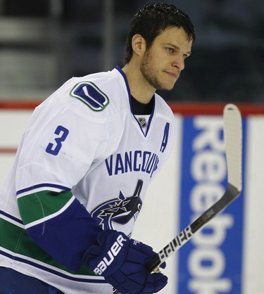 Kevin Bieksa  of the Vancouver Canucks in warm up before playing the Calgary Flames during NHL hockey  in Calgary, Alberta, Wednesday, December 1, 2010.  AL CHAREST/CALGARY SUN