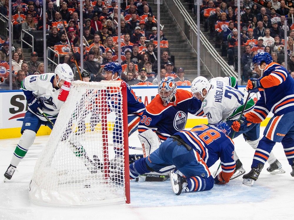 Connor McDavid opens with hat trick, Oilers beat Canucks 5-3