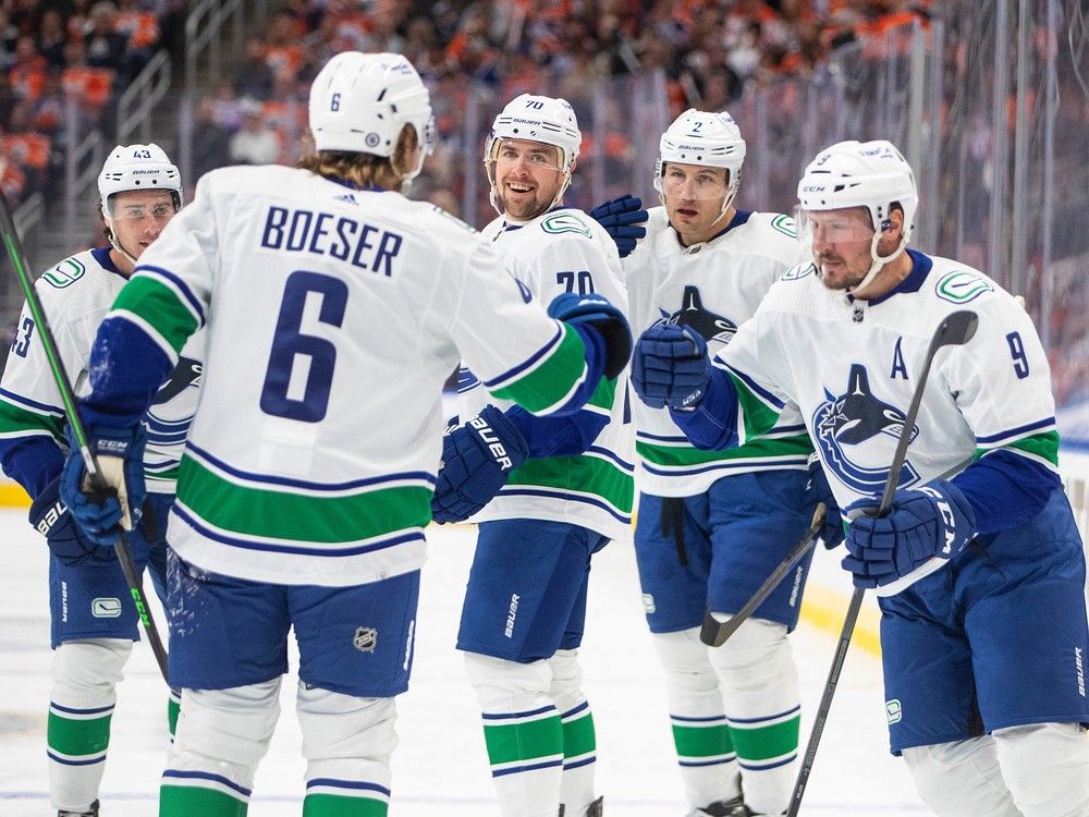 Photos: Canucks And Oilers Start The Season In Edmonton | The Province