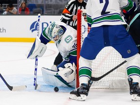 Vancouver Canucks goaltender Thatcher Demko (35) makes a save against the Seattle Kraken during the first period at Climate Pledge Arena. Photo: Joe Nicholson-USA TODAY Sports