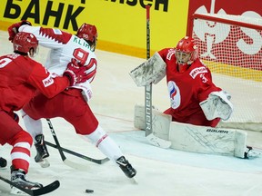 Danila Klimovich of Belarus shoots on goal during the Ice Hockey World Championship group A match between Russia and Belarus at the Olympic Sports Center in Riga, Latvia, Tuesday, June 1, 2021.