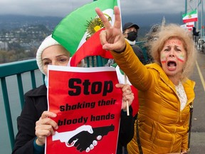 Thousands line the Stanley Park Causeway and across the Lions Gate Bridge on Oct. 29 to take part in a protest against the Iranian regime.