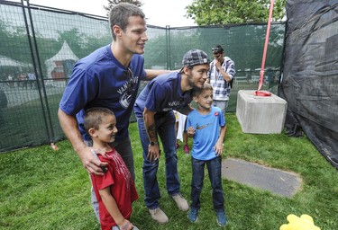 Entertaining their fans Vancouver Canucks Kevin Bieksa, (LEFT) Eddie Lack,  took a numbers of colourful questions and posed with fans during the kids press conference at the PNE.