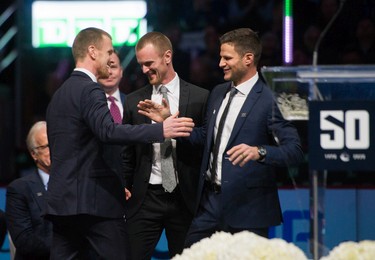 Kevin Bieksa made a speech as Henrik and Daniel Sedin have their jerseys retired before the Vancouver Canucks play the Chicago Blackhawks in NHL league play at Rogers Arena in Vancouver, BC, February 12, 2020. (Arlen Redekop / PNG