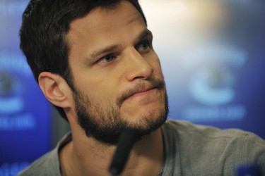 Canucks Kevin Bieksa talks to the media at a press conference  in Vancouver  on April 27, 2015.