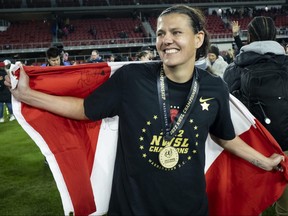 Burnaby native Christine Sinclair, draped in the Canadian flag after her Portland Thorns won this year’s National Women’s Soccer League Championship final, is a consultant to and face of a new women’s pro league being launched in Canada.