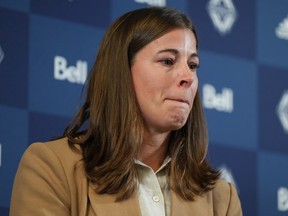 Stephanie Labbé, the Vancouver Whitecaps' new general manager of women's soccer, pauses as she speaks about past abuse and misconduct in the organization on the women's side at Thursday's news conference announcing her hiring.
