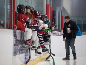 Washington Wild Under-10 girls take a board break during a recent ice session.