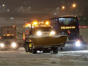 Dozens of vehicles were stranded on the northbound lanes of the Alex Fraser Bridge for several hours due to accumulating snow on Nov. 29. Crews worked to plow and salt the bridge deck.
