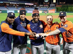 Rafael Montero #47, Bryan Abreu #52, Cristian Javier #53, Christian Vazquez #9 and Ryan Pressly #55 of the Houston Astros pose for a photo after pitching for a combined no-hitter to defeat the Philadelphia Phillies 5-0 in Game Four of the 2022 World Series at Citizens Bank Park on November 02, 2022 in Philadelphia, Pennsylvania.