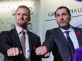 Daniel Sedin and Roberto Luongo show off their Hockey Hall of Fame rings on Friday in Toronto. Henrik Sedin missed the ceremony due to COVID-19 symptoms but is expected to attend Monday's gala event.