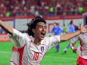 South Korean midfielder Ahn Jung-hwan celebrates following his 'golden goal' over Italy in extra time of their second round match at the 2002 FIFA World Cup.