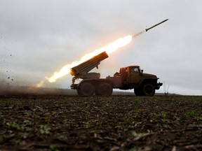 A BM-21 'Grad' multiple rocket launcher fires towards Russian positions on the front line near Bakhmut, Donetsk region, Sunday, Nov. 27, 2022, amid the Russian invasion of Ukraine.