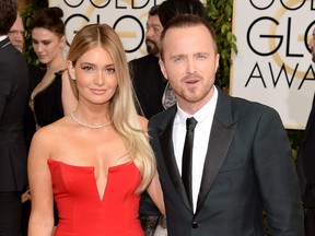 Actor Aaron Paul and wife Lauren Parsekian attend the 71st Annual Golden Globe Awards held at The Beverly Hilton Hotel on Jan. 12, 2014 in Beverly Hills, Calif.