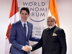 Prime Minister Justin Trudeau welcomes Indian Prime Minister Narendra Modi at the 2018 World Economic Forum in Davos, Switzerland. Working with pluralistic democracies like India should be in Canada's national interest, says Karthik Nachiappan.