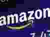 A logo for Amazon is displayed on a screen at the Nasdaq MarketSite, July 27, 2018.