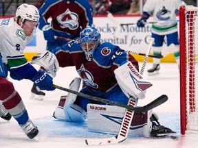 Colorado Avalanche goaltender Pavel Francouz gave up four goals on just 26 shots by the Canucks, including three goals from right in front of the net.