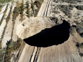 A sinkhole is exposed at a mining zone close to Tierra Amarilla, in Copiapo, Chile, Aug. 1, 2022.