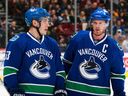 Canucks captain Henrik Sedin has some words of advice for 20-year-old sophomore centre Bo Horvat (left) during a break in a November 2015 NHL game at Rogers Arena.