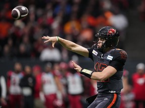 B.C. Lions quarterback Nathan Rourke passes during the first half of the CFL western semi-final football game against the Calgary Stampeders at B.C. Place on Sunday.