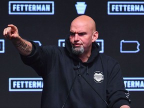 Pennsylvania Democratic Senatorial candidate John Fetterman speaks on stage at a watch party during the midterm elections at Stage AE in Pittsburgh, Pa., on Nov. 8, 2022.