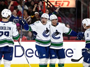 Vancouver Canucks centre Bo Horvat (53) celebrates his goal against the Ottawa Senators during first period NHL hockey action in Ottawa, on Tuesday, Nov. 8, 2022.