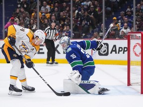 Vancouver Canucks goalie Thatcher Demko stopped Nashville Predators' Michael Granland in the first period of Saturday's game at Rogers Arena.