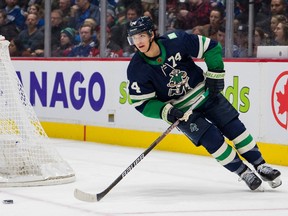 Defenceman Ethan Bear was obtained by the Canucks in an Oct. 28 trade with the Carolina Hurricanes, a deal that cost them a fifth-round draft pick in 2023.