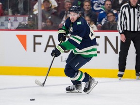 Quinn Hughes, shown in action during Tuesday’s 5-2 loss to the New Jersey Devils, took some personal responsibility for the Canucks’ shortfalls, but the club’s problems go well beyond its defensive woes.