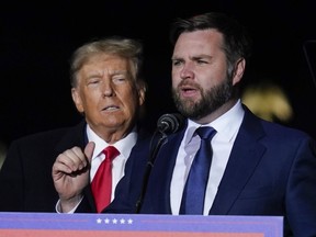 Ohio Senate candidate JD Vance speaks as former President Donald Trump listens at a campaign rally at Wright Bros. Aero Inc. at Dayton International Airport on the eve of midterms. The author won but did not thank Trump in his victory speech.