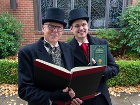 Langley chartered accountants Wayne Kuyer (left) and Kyle Murray as Charles Dickens' A Christmas Carol characters Ebenezer Scrooge and Bob Cratchit.