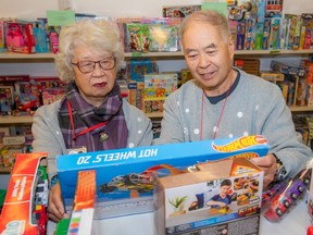 Surrey Christmas Bureau volunteers Victor and Jenny Wong.