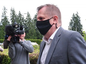 Former Whitecaps women’s coach Bob Birarda arrives at North Vancouver courthouse for a sentencing hearing earlier this year.