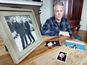 Peter Murray with photos of his brother Barry Murray, who was the best man at his wedding in 1998 (in the photo at left). Barry Murray died of a toxic drug overdose Aug. 3.
