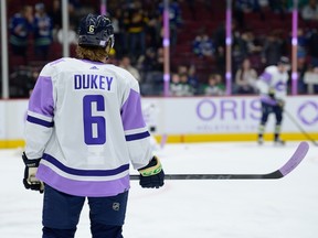 Brock Boeser honoured his late father Duke by wearing a warm up jersey with his name on the back before Saturday's 3-2 OT win over the Arizona Coyotes.