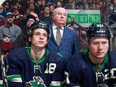 Bruce Boudreau looks onto the ice during the first period of the Canucks NHL game against the Minnesota Wild at Rogers Arena Dec. 10, 2022 in Vancouver.