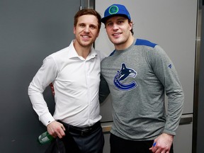 VANCOUVER, BC - JANUARY 23: Luke Schenn #2 of the Vancouver Canucks stands with his brother Brayden Schenn #10 of the St. Louis Blues after their NHL game at Rogers Arena January 23, 2022 in Vancouver, British Columbia, Canada.