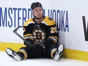 Curtis Lazar of the Boston Bruins sticks his tongue out during the third period of the first round of the 2022 Stanley Cup Playoffs at TD Garden May 6 against the Carolina Hurricanes.