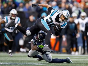 Panthers run over and through Seahawks for 30-24 victory