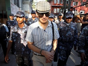 French serial killer Charles Sobhraj leaves Kathmandu district court after his hearing in Kathmandu, May 31, 2011.