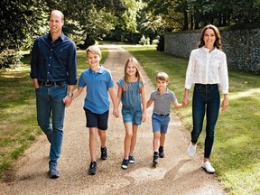 Prince William and Catherine are pictured with their children in their 2022 Christmas Card photo.