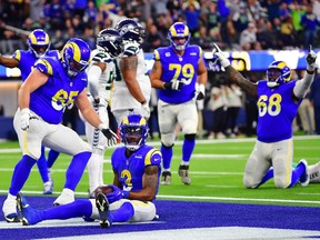 Los Angeles Rams running back Cam Akers (3) celebrates his touchdown scored against the Seattle Seahawks during the second half at SoFi Stadium.