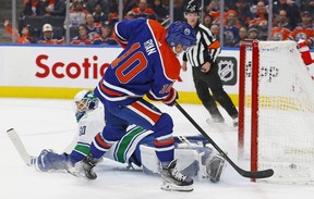 Edmonton Oilers forward Derek Ryan (10) scores a goal during the first period against Vancouver Canucks goaltender Collin Delia (60) at Rogers Place Dec. 23, 2022.